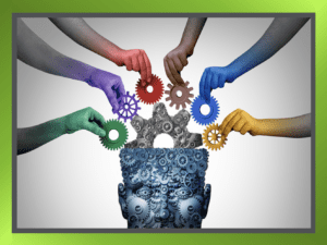 Illustration of an open head with diverse individuals reaching in, placing different colored cogs inside, symbolising the celebration of neurodiversity.