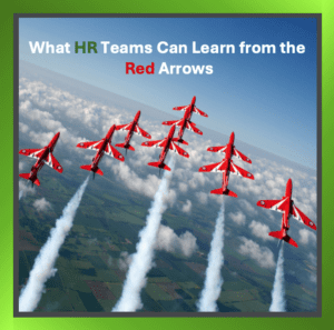 Red Arrows flying in formation against a clear sky