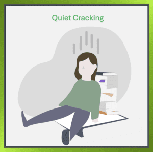 An office worker showing subtle signs of burnout present, productive, but quietly struggling.