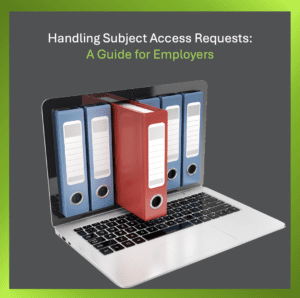 Computer and box files illustrating the process of handling Subject Access Requests for employers.