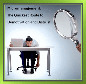 A person sits at a desk with a large magnifying glass, symbolising micromanagement and the critique of over-control.