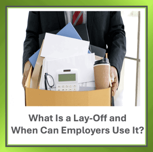 Person holding a box of office items to represent a lay-off and job uncertainty